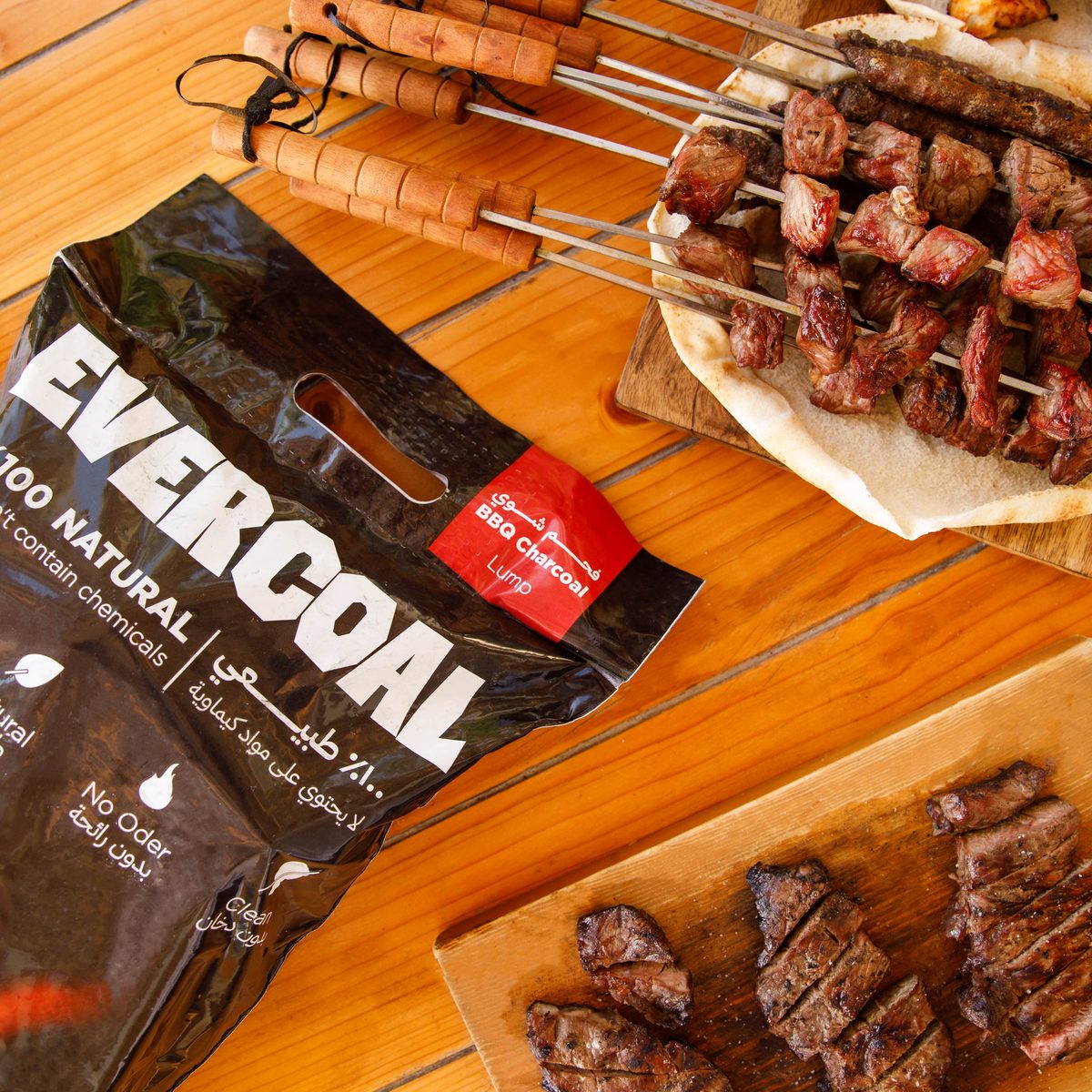 Evercoal BBQ charcoal فحم الشواء with grilled meat skewers